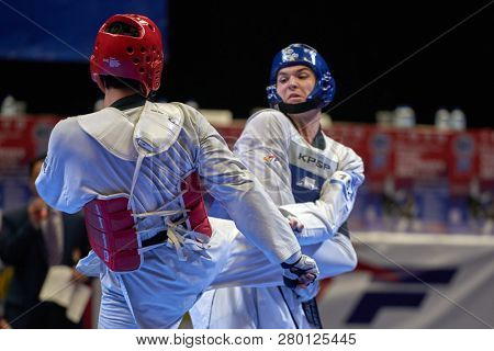 ST. PETERSBURG, RUSSIA - OCTOBER 17, 2015: Taekwondo WTF junior teams match Russia vs Iran during the martial arts festival Baltic Sea Cup in Sibur Arena