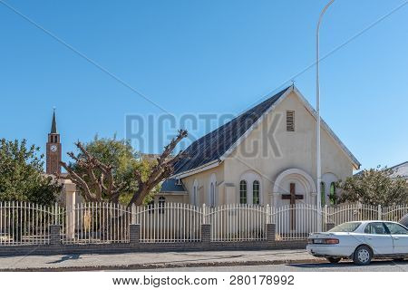 De Aar, South Africa, August 6, 2018: A Street Scene, With The Methodist Church, In De Aar In The No