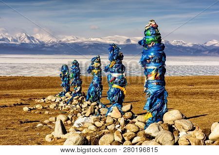 Sacred Place With Obo. Winter Landscape Of Mongolia. Lake Khubsugul And Mountain