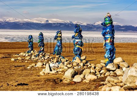 Sacred Place With Obo. Winter Landscape Of Mongolia. Lake Khubsugul And Mountain