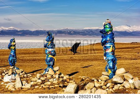 Sacred Place With Obo. Winter Landscape Of Mongolia. Lake Khubsugul And Mountain
