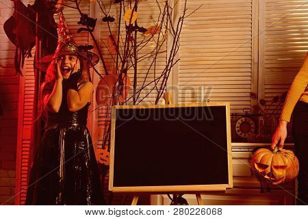 Little Girl Happy Smile On Halloween. Happy Little Girl Enjoy Halloween Party. Happy As A Witch In A