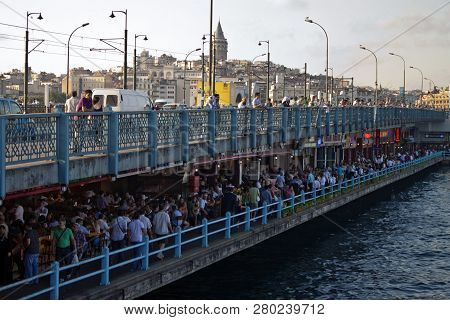 Istanbul, Turkey - August 13 : People Have Fun At Cafes And Restaurant On Galata Bridge On August 13