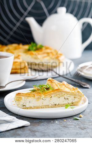 Pie With Salted Soft Cheese And Greens