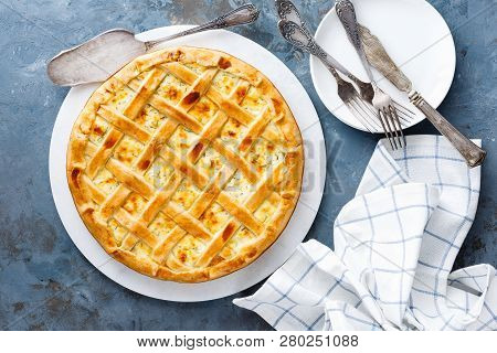 Pie With Salted Soft Cheese And Greens, Top View