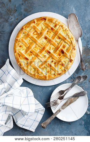 Pie With Salted Soft Cheese And Greens, Top View