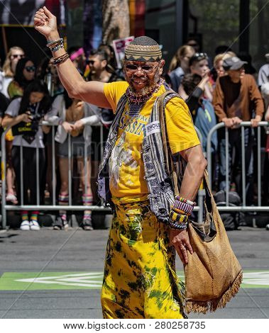 San Francisco, California, June 24, 2018:  Gay Pride Parade -man Marches Solo In Parade