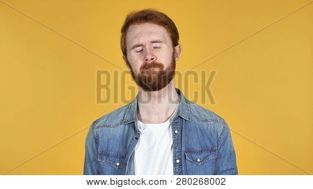 Sad Upset Redhead Man Isolated On Yellow Background
