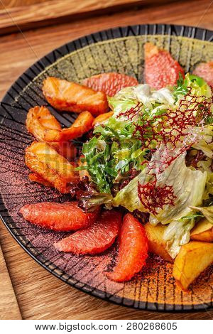 Modern Arabic Cuisine In 2019. Asian Salad Of Fried Salmon, Avacado, Grapefruit And Salad Mix, With