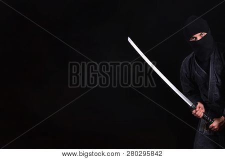 Ninja With Katana Cropped. Martial Arts Background.