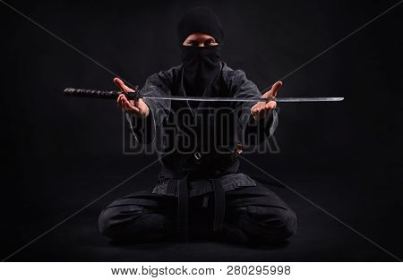 Ninja Samurai Holds Katana In A Hands