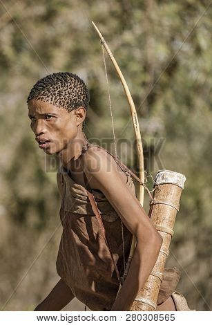 Erindi, Namibia - July 19, 2018: A Native Bushman Gives A Farewell Dance To Wish Good Hunting To The