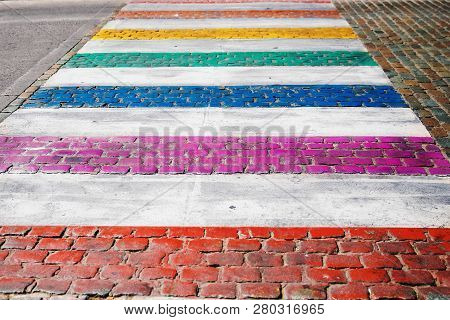 Lgbt Gay Flag Color Painted On Pedestrian Crossing Road In Europe, Belgium.
