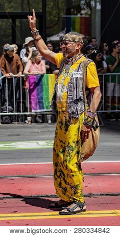 San Francisco, California, June 24, 2018:  Gay Pride Parade -man Marches Solo In Parade