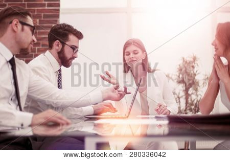 business team using laptop to get new informatio