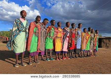 Masai Mara - Kenya / December 2017: Masai Women During Ritual Dance At Small Village South Of Kenya.