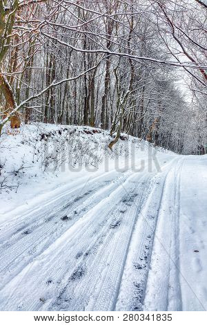 Silence On A Winter Road In The Forest. Lots Of Snow In Winter Time