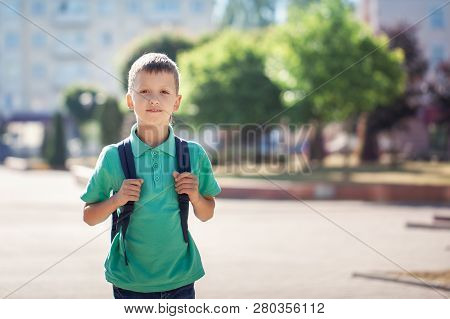 Child With School Bag. Kid Outdoors. Back To School Concept.