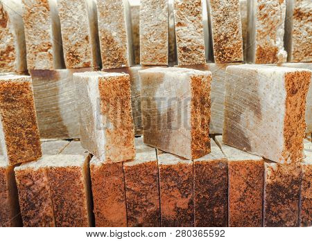Bars Of Soap On A Shop Window. Cinnamon Soap With Natural Cedar Oil And Herbal Ingredients. Handmade