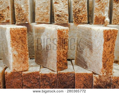 Bars Of Soap On A Shop Window. Cinnamon Soap With Natural Cedar Oil And Herbal Ingredients. Handmade