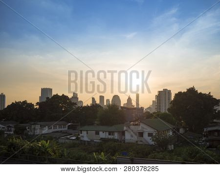 Dramatic View Of Cityscape And Home On Sunset At Khlong Toei , Bangkok , Thailand