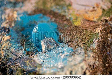 Oil Art Paints On A Very Old Palette. Close-up