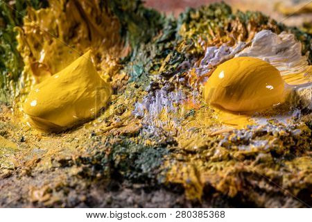 Oil Art Paints On A Very Old Palette. Close-up