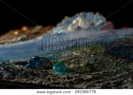 Oil Art Paints On A Very Old Palette. Close-up