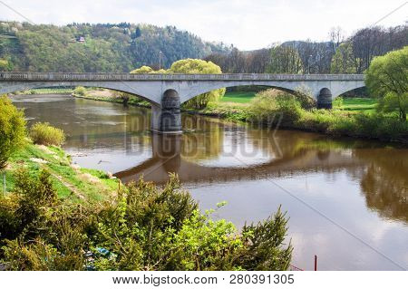 Berounka River With A Bridge In Zbecno Village, Czech Republic
