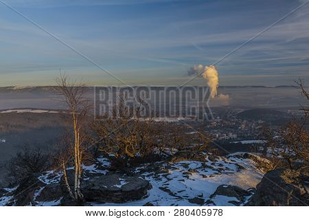 Sunrise On Boren Hill Near Bilina Town In Winter Frosty Color Morning
