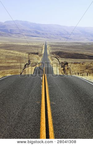 Abrupt bends of road on open spaces of the Californian steppes