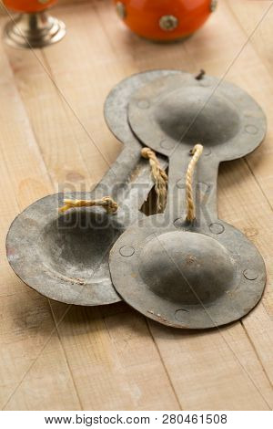 Single traditional iron Moroccan krakebs used in Gnawa music