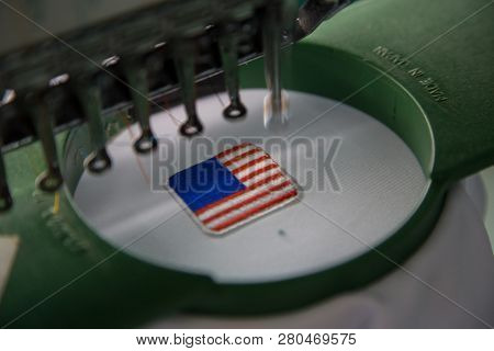 Close-up Of Embroidery Malaysia Logo With Wording Negaraku (my Country) On White Uniform