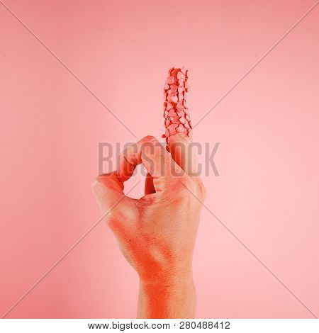Hand Shows Aggressive Ok Gesture With The Middle Finger. Fuck You Aan Okey Concept. Minimal Style In