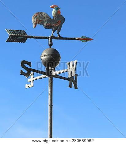 Metallic Cock Vane To Indicate The Wind Direction With The Letters Of The Cardinal Points