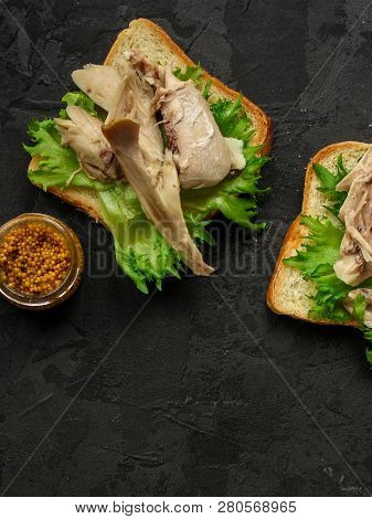 sandwich with chicken and lettuce. food background. copy space