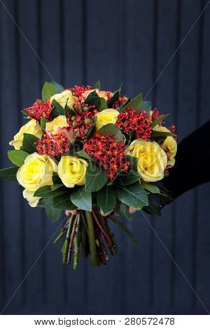 Stylish Beautiful Bouquet In Yellow And Coral Colors Of Roses, Jatropha Multifida And Other Plants I