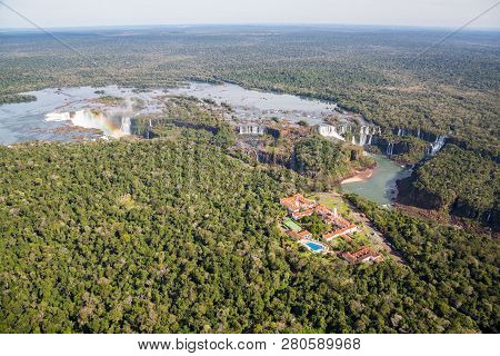Aerial Bird's-eye View Panorama Of Iguazu Falls From Above, From A Helicopter. Border Of Brazil And 