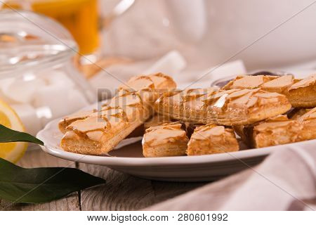 Puff Pastry Cookies With Jam On White Dish.