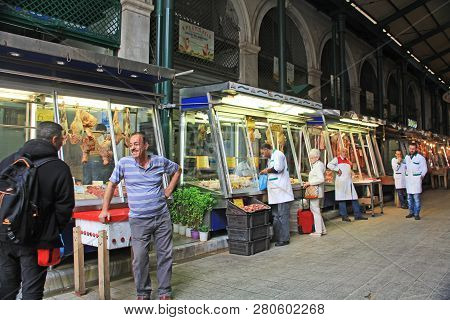 Athens, Attica, Greece - October 17, 2018:  Shoppers And Owners Along A Large Hall In The Huge  Cove