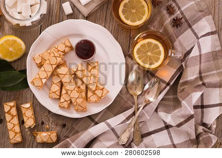 Puff Pastry Cookies With Jam On White Dish.