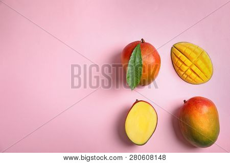 Flat Lay Composition With Ripe Mangoes And Space For Text On Color Background