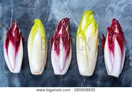 Food Background, Flat Lay Concept With Fresh Green Belgian Endive Or Chicory And Red Radicchio Veget