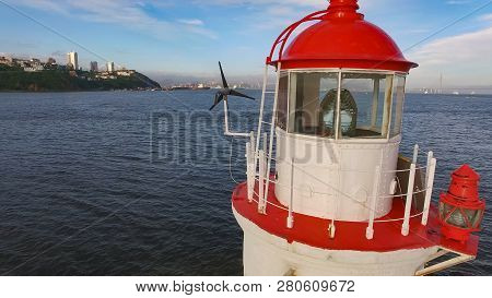 White Lighthouse With Red Roof On Tokarev Cat. Vladivostok, Russia