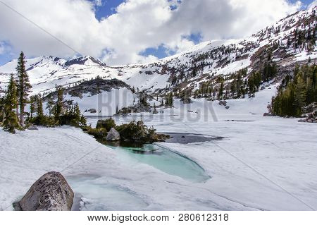 Views Of Frozen Fontanillis Lake And Dicks Peak In Late Spring. Desolation Wilderness, El Dorado Cou