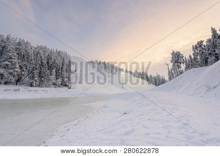 Rukatunturi Ski Jumping Hill In Winter Season And Nice Weather And Blue Sky In Winter Season And Sun