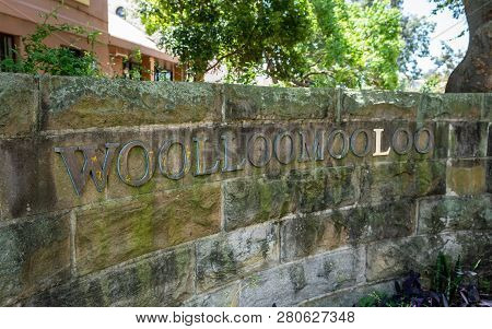 Woolloomooloo Neighbourhood Entrance Sign With Name Written On A Wall In Sydney Nsw Australia