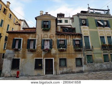 Old Facades Venetian Houses In Venece. Italy, Europe.