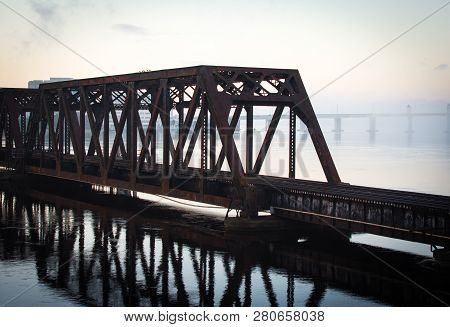 Weathered Railroad Bridge Over The St Johns River In Downtown Jacksonville Florida