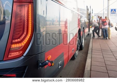 Closeup Of Modern Public Bus With Open Door At Bus Station